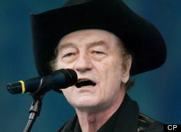 Stompin' Tom Connors performs at Live from Rideau Hall, a concert held at Rideau Hall in Ottawa Sunday, June 16, 2002. THE CANADIAN PRESS/Jonathan Hayward