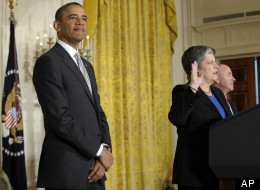 President Barack Obama listens as Homeland Security Secretary Janet Napolitano delivers the oath of allegiance during a naturalization ceremony for active duty service members and civilians, Monday, March 25, 2013, in the East Room of the White House in Washington. At right is Alejandro Mayorkas, director of United States Citizenship and Immigration Services (USCIS). (AP Photo/Susan Walsh)