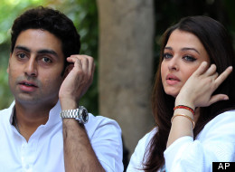 Abhishek Bachchan, with wife Aishwarya Rai Bachchan, is full of praise for Vancouver ahead of the Times of Indian Film Awards. (Associated Press)