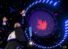 Prime Minister Stephen Harper waves to the crowd following his speech on election night in Calgary, Alta, May 2, 2011. THE CANADIAN PRESS/Jonathan Hayward