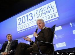 Former U.S. President Bill Clinton (R), founder of the William J. Clinton Foundation, and Bill Gates (L), co-chairman and trustee of the Bill & Melinda Gates Foundation, participate in an event sponsored by the Peter G. Peterson Foundation at the Mellon Auditorium May 7, 2013 in Washington, D.C. (Photo by Win McNamee/Getty Images)