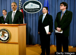 Acting commissioner of the IRS, Steven Miller (far right), shown during a news conference at the Department of Justice on Dec. 16, 2009, with Attorney General Eric Holder, expressed