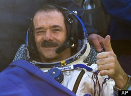 Canadian astronaut Chris Hadfield, who became a worldwide sensation thanks to his tweets, musical performances and stunning photos from the International Space Station, was back on the ground Monday night. (CP/AP)
