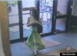 Investigators are looking for this woman who robbed a bank on Monday in Stuart, Iowa, in a stylish green dress.