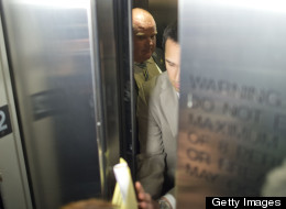 Rob Ford walked through a throng of media to an elevator in City Hall Monday afternoon after his press secretaries quit. (Lucas Oleniuk/Toronto Star via Getty Images)