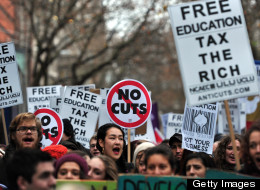 Demonstrators chant slogans during a student rally in central London on November 21, 2012 against sharp rises in university tuition fees, funding cuts and high youth unemployment. AFP PHOTO/CARL COURT (Photo credit should read CARL COURT/AFP/Getty Images)