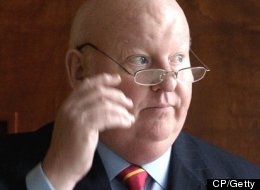 No charges have been laid against either Mike Duffy (right) or Nigel Wright, but the RCMP is investigating the circumstances that led to Wright writing a personal cheque after Duffy told him he didn't have the money himself.<