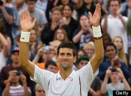 Serbia's Novak Djokovic celebrates beating US player Bobby Reynolds during their second round men's singles match on day four of the 2013 Wimbledon Championships tennis tournament at the All England Club in Wimbledon, southwest London, on June 27, 2013. Djokovic won 7-6, 6-3, 6-1. (BEN STANSALL/AFP/Getty Images)