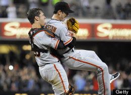 Tim Lincecum #55 of the San Francisco Giants is lifted by Buster Posey #28 after pitching a no-hitter during a baseball game against the San Diego Padres at Petco Park on July 13, 2013 in San Diego, California. (Photo by Denis Poroy/Getty Images)