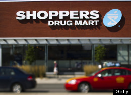 A Shoppers Drug Mart Corp. store stands in this photo taken with a tilt-shift lens in Toronto, Ontario, Canada, on Saturday, Aug. 27, 2011. Shoppers Drug Mart Corp. is Canada's largest pharmacy chain with more than 1,149 stores operating in nine provinces and two territories. Photographer: Brent Lewin/Bloomberg via Getty Images