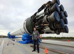 Elon Musk, founder of Sapcex and Tesla, stands in front of a Spacex rocket. Elon Musk is promising to reveal design plans for his Hyperloop technology on Monday. (Spacex)