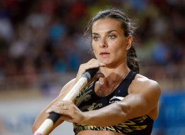 Russia's Yelena Isinbayeva competes in the women's pole vault at the Herculis international athletics meeting, at the Louis II Stadium in Monaco, Friday, July 20, 2012.