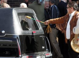 A drummer pays homage to Brian Sinclair whose body was placed in a hearse after funeral service in this Sept 26, 2008 photo, in Winnipeg. Winnipeg police say they will launch a criminal investigation into the death of a homeless man who waited for 34 hours in a hospital's emergency room. THE CANADIAN PRESS/ Winnipeg Free Press - Wayne Glowacki