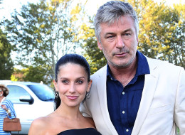 Hilaria Baldwin and Alec Baldwin demonstrate partner exercises in her new yoga DVD.
