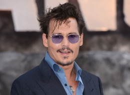 LONDON, ENGLAND - JULY 21: Johnny Depp attends the UK Premiere of 'The Lone Ranger' at Odeon Leicester Square on July 21, 2013 in London, England. (Photo by Karwai Tang/WireImage)