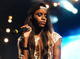 READING, UNITED KINGDOM - AUGUST 25: Angel Haze performs on stage on Day 3 of Reading Festival 2013 at Richfield Avenue on August 25, 2013 in Reading, England. (Photo by Joseph Okpako/Redferns via Getty Images)