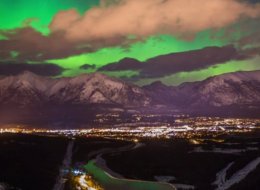 Photographers capture stunning northern lights display over Alberta's Rockies.