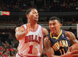CHICAGO, IL - NOVEMBER 16: Orlando Johnson #11 of the Indiana Pacers drives past Derrick Rose #1 of the Chicago Bulls on November 16, 2013 at the United Center in Chicago, Illinois. NOTE TO USER: User expressly acknowledges and agrees that, by downloading and/or using this photograph, user is consenting to the terms and conditions of the Getty Images License Agreement. Mandatory Copyright Notice: Copyright 2013 NBAE (Photo by Ray Amati/NBAE via Getty Images)