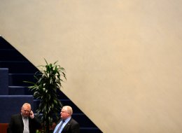 Toronto City Councillor Doug Ford stands with his brother Toronto Mayor Rob Ford during a city hall meeting November 15, 2013. (Carlos Osorio/Toronto Star via Getty Images)