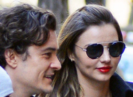 Orlando Bloom and Miranda Kerr reunite with son Flynn out on the Upper East Side in New York City on Nov. 30.