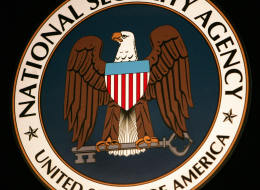 Fort Meade, UNITED STATES: The logo of the National Security Agency (NSA) hangs at the Threat Operations Center inside the NSA in the Washington suburb of Fort Meade, Maryland, 25 January 2006. US President George W. Bush delivered a speech behind closed doors and met with employees in advance of Senate hearings on the much-criticized domestic surveillance. AFP PHOTO/Paul J. RICHARDS (Photo credit should read PAUL J. RICHARDS/AFP/Getty Images)