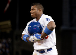 Yasiel Puig #66 of the Los Angeles Dodgers reacts after grounding into a double play in the ninth inning against the St. Louis Cardinals in Game Four of the National League Championship Series at Dodger Stadium on October 15, 2013 in Los Angeles, California.