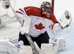 Canada's goalie Roberto Luongo (1) makes a save in the third period of a men's gold medal ice hockey game against USA at the Vancouver 2010 Olympics in Vancouver, British Columbia, Sunday, Feb. 28, 2010.