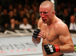 Georges St-Pierre stands in the Octagon during his UFC welterweight championship bout against Johny Hendricks during the UFC 167 event inside the MGM Grand Garden Arena on November 16, 2013 in Las Vegas, Nevada. (Photo by Josh Hedges/Zuffa LLC/Zuffa LLC via Getty Images)