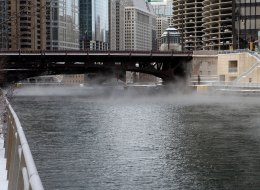 Three people fell into the Chicago River early Monday leaving one dead, one presumed dead and a third in stable condition.