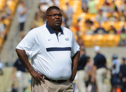 PITTSBURGH - SEPTEMBER 10: Assistant head coach Calvin Magee of the University of Pittsburgh Panthers looks on from the field before a college football game against the Maine Black Bears at Heinz Field on September 10, 2011 in Pittsburgh, Pennsylvania. The Pitt Panthers defeated the Black Bears 35-29. (Photo by George Gojkovich/Getty Images)