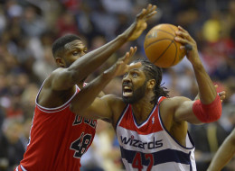 Chicago center Nazr Mohammed (48), defends Washington power forward Nene (42) going up for a shot as the Washington Wizards host the Chicago Bulls at the Verizon Center in Washington DC, January16, 2014. ( Photo by John McDonnell/The Washington Post via Getty Images)
