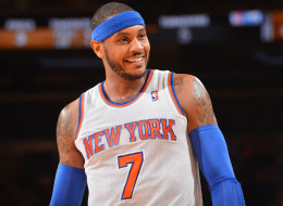 Carmelo Anthony #7 of the New York Knicks smiles against the Philadelphia 76ers during the game on January 22, 2014 at Madison Square Garden in New York City, New York.