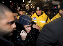 Justin Bieber arrives at a Toronto Police station to face assault charges. (Nathan Denette/CP)