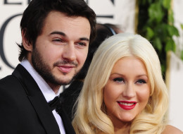 Singer/actress Christina Aguilera and boyfriend Matt Rutler arrive for the 68th annual Golden Globe awards at the Beverly Hilton Hotel in Beverly Hills, California January 16, 2011. AFP PHOTO / Robyn BECK (Photo credit should read ROBYN BECK/AFP/Getty Images)