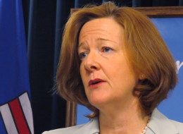 Alberta Premier Alison Redford speaks to reporters in Edmonton on Tuesday March 4, 2014. Redford revealed Tuesday that she spent taxpayers' money to fly her daughter's friends around on government aircraft, but says she will now pay back the $3,100 tab. THE CANADIAN PRESS/Dean Bennett