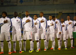 The USA team stands for the national anthem during the Ukraine v USA International Friendly at Antonis Papadopoulos stadium on March 5, 2014 in Larnaca, Cyprus. (Photo by Andrew Caballero-Reynolds/Getty Images)