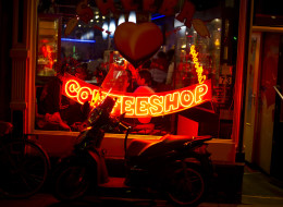 People sit inside a coffee shop on November 1, 2012 in the center of Amsterdam, Netherlands. (Jasper Juinen/Getty Images)