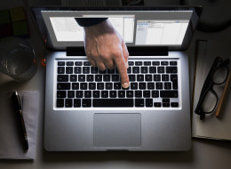Many of the Justice Department's finest legal minds are falling prey to a garden-variety Internet scam.