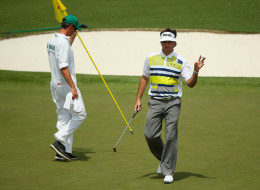 Bubba Watson of the United States reacts after finishing the 17th hole during the second round of the 2014 Masters Tournament at Augusta National Golf Club on April 11, 2014 in Augusta, Georgia. (Photo by Andrew Redington/Getty Images)