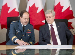 Prime Minister Stephen Harper says Canada will contribute six CF-18 jet fighters to a NATO air-policing mission as a response to the crisis in the Ukraine. (CP)