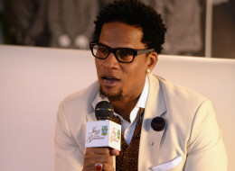 MIAMI GARDENS, FL - MARCH 15: Host D.L. Hughley attends Day 1 of Jazz In The Gardens at Sun Life Stadium on March 15, 2014 in Miami Gardens, Florida. (Photo by Larry Marano/Getty Images for Jazz In The Gardens)