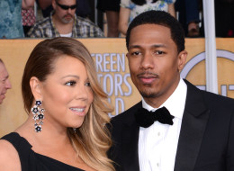 LOS ANGELES, CA - JANUARY 18: Singer Mariah Carey and Husband Nick Cannon arrive at the 20th Annual Screen Actors Guild Awards at The Shrine Auditorium on January 18, 2014 in Los Angeles, California. (Photo by C Flanigan/Getty Images)