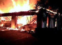 In this photo provided by the Hillsborough County Sheriff's Office, flames destroy a mansion owned by former tennis star James Blake Wednesday May 7, 2014, in a gated community in Tampa, Fla. Officials have confirmed that three bodies have been found in the home. Hillsborough County Sheriff's Spokeswoman Cristal Bermudez Nunez says neighbors have told detectives that Blake hasn't lived in the house for a while and was renting it out. (AP Photo/Hillsborough County Sheriff's Office)