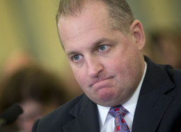 John Mulligan, now the interim CEO of Target Corp., listens during a Senate Commerce Committee hearing in Washington, D.C., U.S., on Wednesday, March 26, 2014.