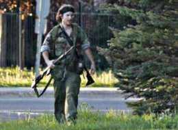 A man identified by police as Justin Bourque is seen in Moncton on Wednesday.