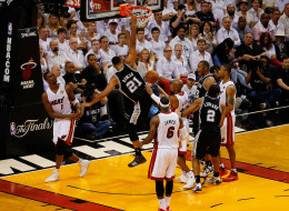 Tim Duncan #21 of the San Antonio Spurs dunks against the Miami Heat during Game Four of the 2014 NBA Finals at American Airlines Arena on June 12, 2014 in Miami, Florida. NOTE TO USER: User expressly acknowledges and agrees that, by downloading and or using this photograph, User is consenting to the terms and conditions of the Getty Images License Agreement. (Photo by Chris Trotman/Getty Images)