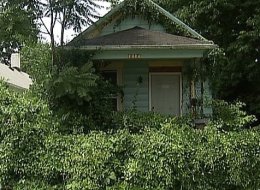 A boy found a mummified corpse hanging in this Dayton, Ohio home Sunday.