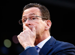 BOSTON, MA - APRIL 22: Connecticut governor Dannel Malloy talks with members of the national champion Connecticut Huskies men's basketball tem prior to the game between the Boston Red Sox and the New York Yankees at Fenway Park on April 22, 2014 in Boston, Massachusetts. (Photo by Jared Wickerham/Getty Images)