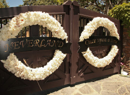 LOS OLIVOS, CA - JUNE 28: Wreaths hanges on the entrance at Michael Jackson's Neverland Ranch on June 28, 2009 in Los Olivos, California. (Photo by Alberto E. Rodriguez/Getty Images)