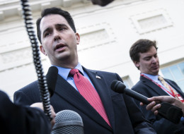 Wisconsin Governor Scott Walker speaks with reporters after a meeting at the White House December 4, 2012 in Washington, DC. (BRENDAN SMIALOWSKI/AFP/Getty Images)
